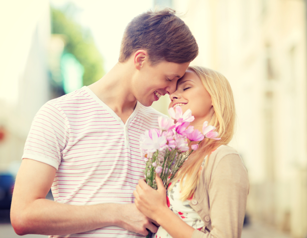 couple with flowers in the city