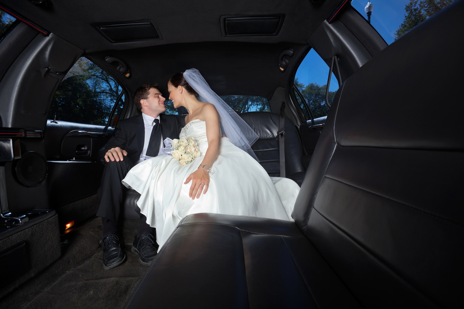 Wedding Couple in Limo